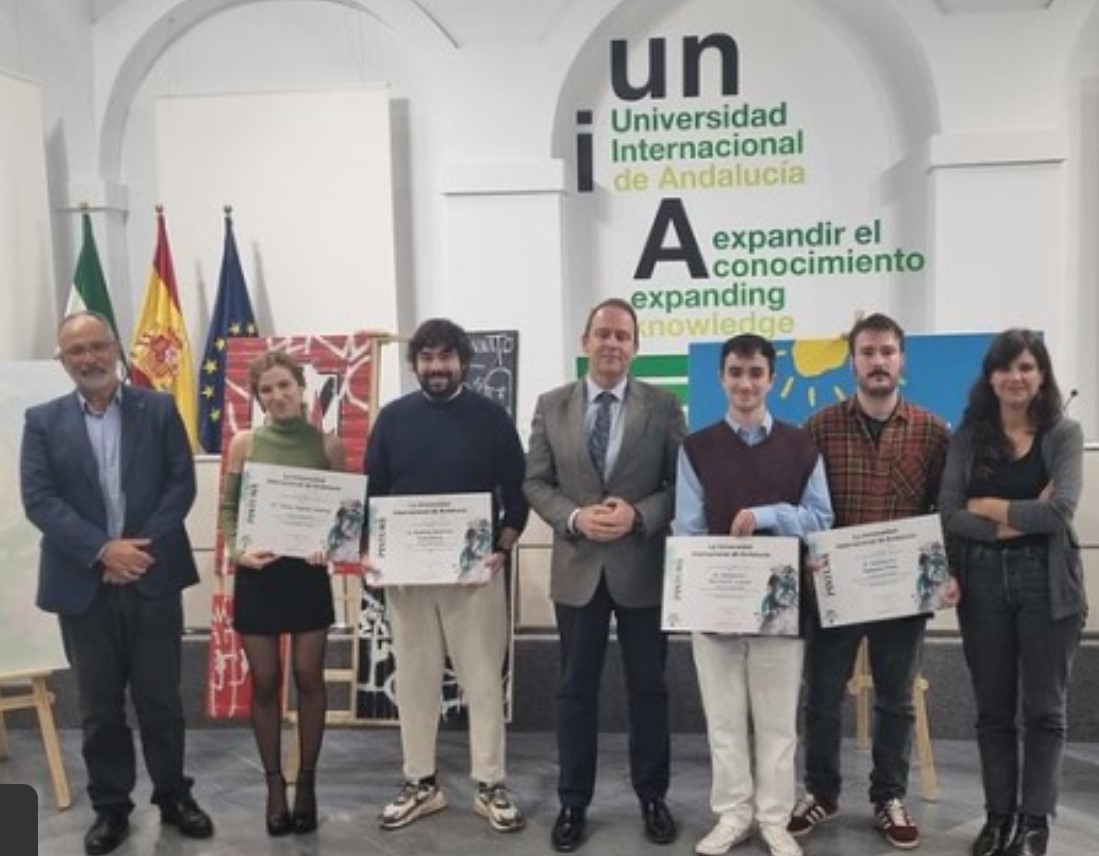 Los premiados con el rector José Ignacio García